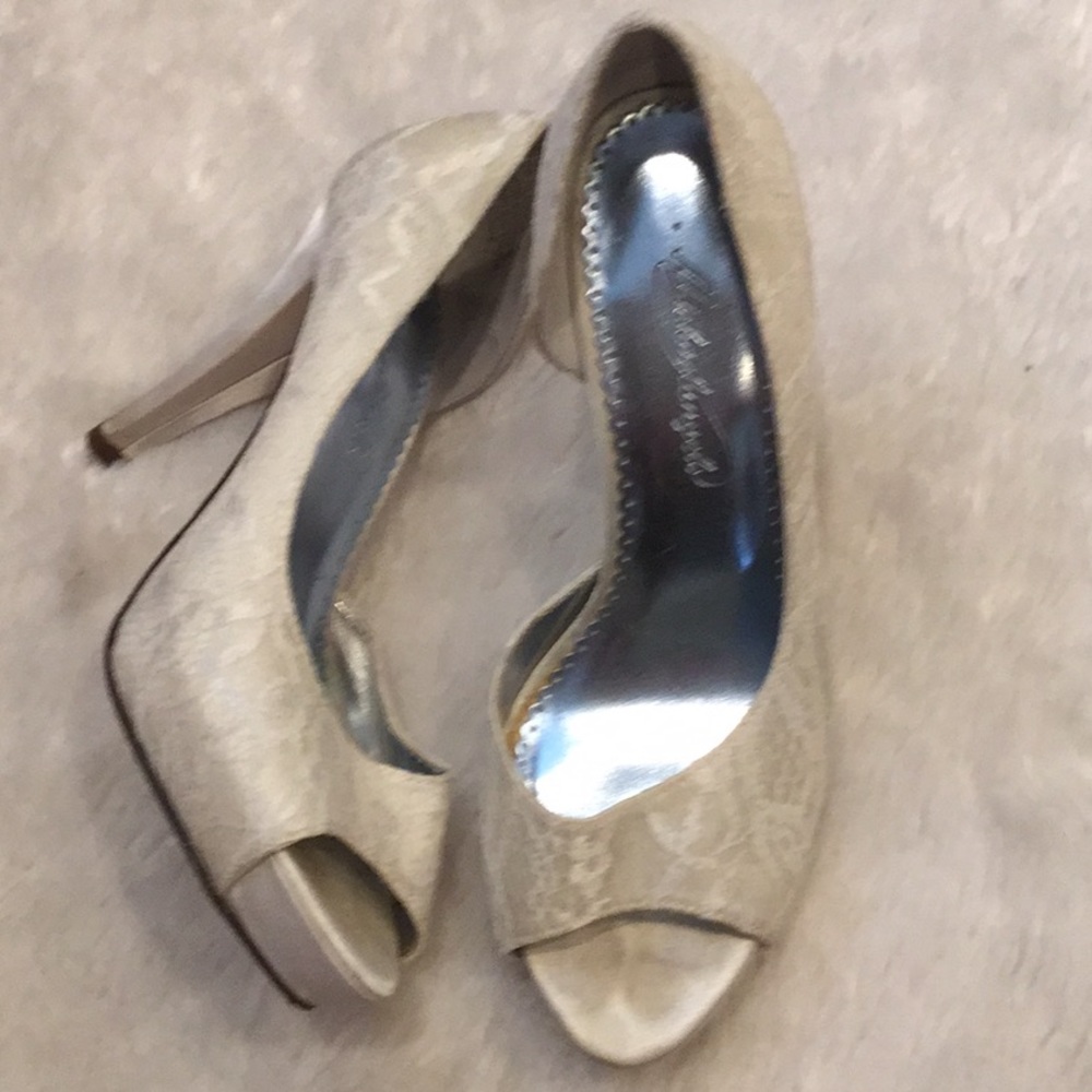 Michelangelo White heels.